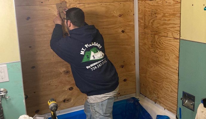 Expert performing a bathroom conversion