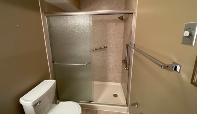 Bathroom with shower area and toilet