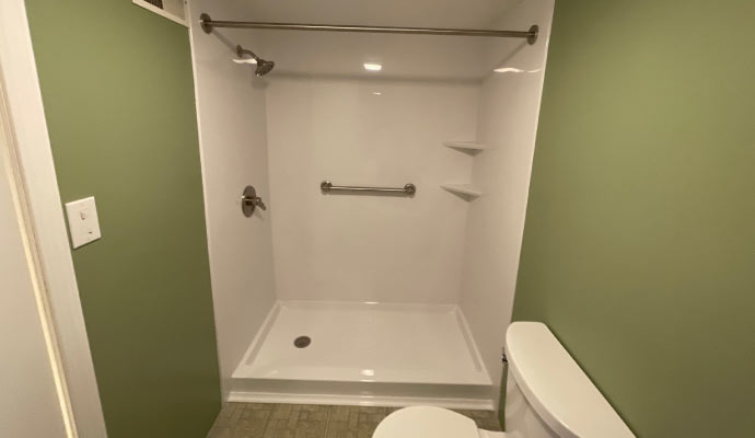 An installed modern shower stall