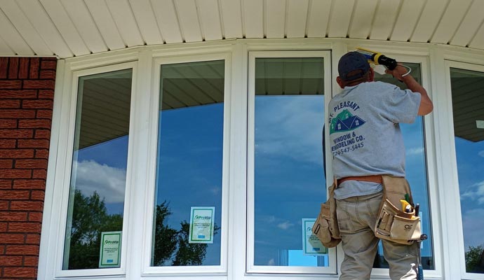 Professional installing a new window